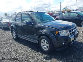 2011 Ford Escape Hybrid with VIN 1FMCU5K37BKA22327, listed as a IAAI auction lot 41906927 with 135,027 mi miles. Bid and sale history available at carsss.com. Image 1.