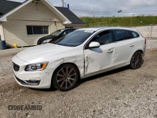 2015 Volvo V60 T5 Drive-E Premier Plus with VIN YV140MEC4F1204163, listed as a Copart auction lot 62983433 with 117,836 mi miles. Bid and sale history available at carsss.com. Image 1.