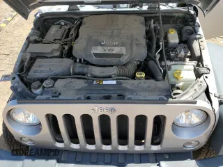 2016 Jeep Wrangler Unlimited Freedom with VIN 1C4BJWDG7GL117972, listed as a Copart auction lot 57996765 with 56,713 mi miles and Salvage title. Bid and sale history available at DreamBid. Image 12.