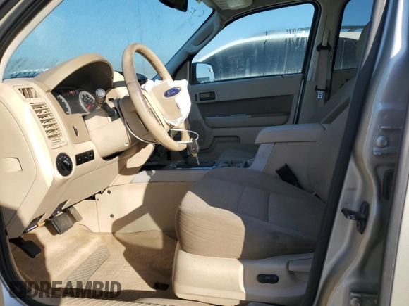 2010 Ford Escape XLT с VIN 1FMCU0D71AKA71198, выставлен на аукционе Copart как лот 48766805 с пробегом 243 732 миль миль и Списание • Salvage title. История ставок и продаж доступна на DreamBid. Изображение 7.