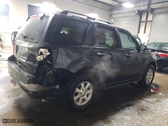 2010 Mazda Tribute Touring with VIN 4F2CY9C70AKM07812, listed as a Copart auction lot 42432055 with 132,562 mi miles and Salvage Title. Bid and sale history available at carsss.com. Image 3.