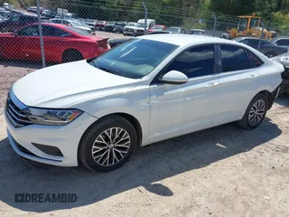 2021 Volkswagen Jetta S z VIN 3VWC57BU6MM045659, wystawiony jako IAAI lot #42201090 z przebiegiem 66 937 mil mil oraz . Historia ofert i sprzedaży dostępna na DreamBid. Obrazek 21.