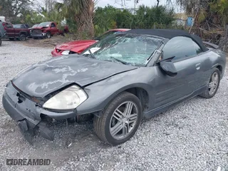 2003 Mitsubishi Eclipse GT with VIN 4A3AE55HX3E174745, listed as a IAAI auction lot 41303685 with 103,147 mi miles. Bid and sale history available at carsss.com. Image 2.