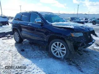 2017 Jeep Grand Cherokee Limited with VIN 1C4RJFBG0HC889040, listed as a IAAI auction lot 41514747 with 99,802 mi miles. Bid and sale history available at carsss.com. Image 1.