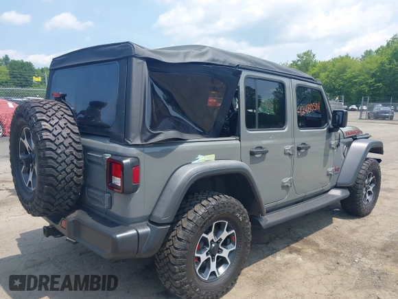 2021 Jeep Wrangler Unlimited Rubicon with VIN 1C4HJXFN3MW816375, listed as a IAAI auction lot 42480514 with 62,324 mi miles and . Bid and sale history available at DreamBid. Image 4.