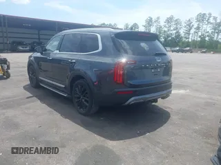 2021 Kia Telluride SX with VIN 5XYP54HC7MG130377, listed as a IAAI auction lot 42172684 with 32,186 mi miles and . Bid and sale history available at DreamBid. Image 3.
