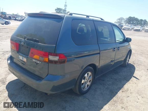 2003 Honda Odyssey EX with VIN 5FNRL18683B132703, listed as a IAAI auction lot 42004982 with Not Provided miles and . Bid and sale history available at DreamBid. Image 4.