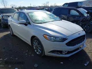 2017 Ford Fusion SE z VIN 3FA6P0H77HR277995, wystawiony jako IAAI lot #41586483 z przebiegiem 191 912 mil mil oraz . Historia ofert i sprzedaży dostępna na DreamBid. Obrazek 1.