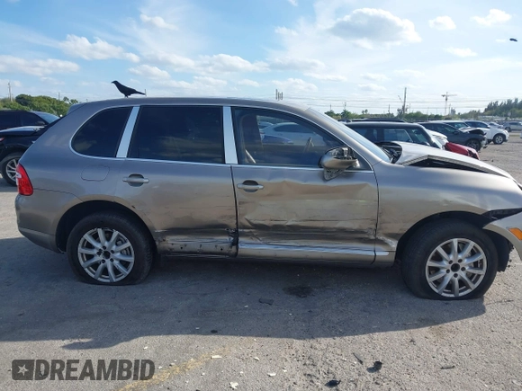 2005 Porsche Cayenne S with VIN WP1AB29P75LA61263, listed as a IAAI auction lot 41635350 with 242,874 mi miles. Bid and sale history available at carsss.com. Image 14.