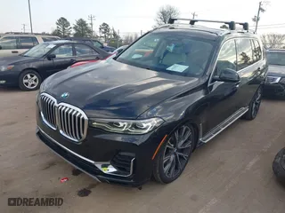 2019 BMW X7 xDrive50i with VIN 5UXCX4C51KLS36907, listed as a IAAI auction lot 41525923 with 75,791 mi miles. Bid and sale history available at carsss.com. Image 2.