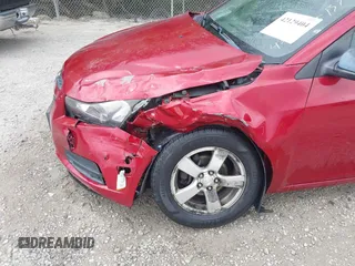 2014 Chevrolet Cruze 1LT with VIN 1G1PC5SB2E7357639, listed as a IAAI auction lot 42129404 with 154,174 mi miles and . Bid and sale history available at DreamBid. Image 6.