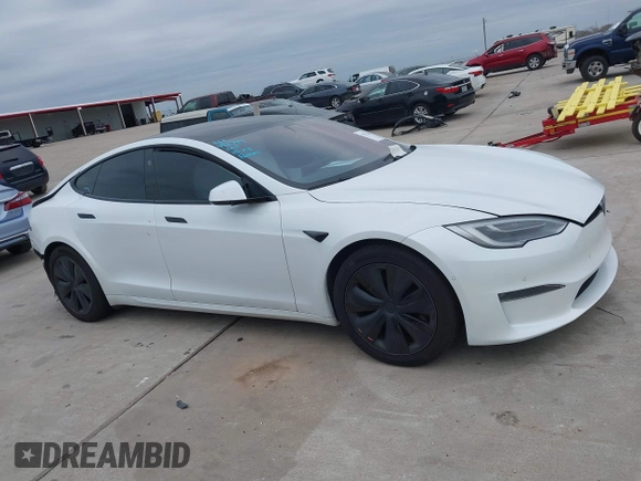 2021 Tesla Model S Plaid z VIN 5YJSA1E64MF452744, wystawiony jako IAAI lot #41375136 z przebiegiem Nie podano mil oraz . Historia ofert i sprzedaży dostępna na DreamBid. Obrazek 12.