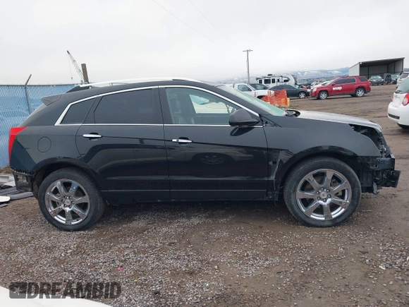 2012 Cadillac SRX Premium Collection with VIN 3GYFNFE35CS599969, listed as a IAAI auction lot 41764337 with 154,864 mi miles and . Bid and sale history available at DreamBid. Image 14.