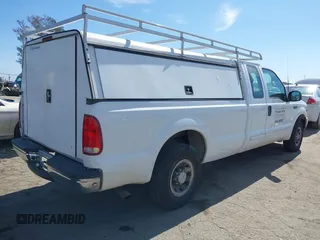 2001 Ford Super Duty F-250 XL with VIN 1FTNX20S11EA60775, listed as a IAAI auction lot 41631692 with 151,485 mi miles. Bid and sale history available at carsss.com. Image 4.