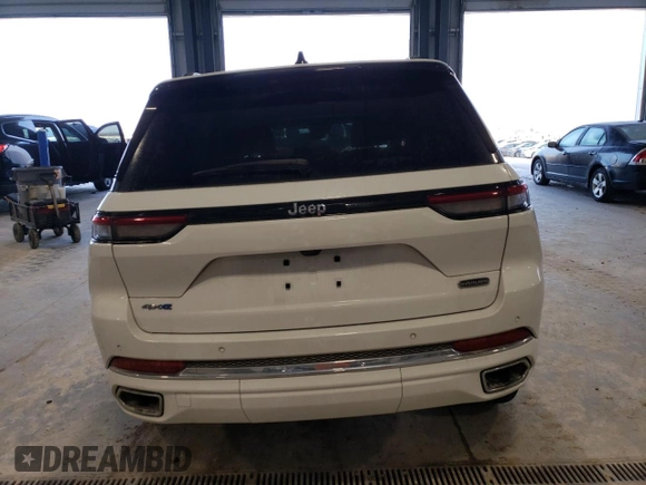 2022 Jeep Grand Cherokee Overland with VIN 1C4RJYD68N8716557, listed as a Copart auction lot 86807614 with 12,590 mi miles and Salvage title. Bid and sale history available at DreamBid. Image 6.