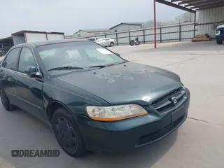 1999 Honda Accord LX z VIN JHMCG5548XC046166, wystawiony jako IAAI lot #42177926 z przebiegiem 273 532 mil mil oraz . Historia ofert i sprzedaży dostępna na DreamBid. Obrazek 1.