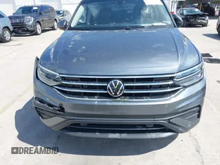 2023 Volkswagen Tiguan SE z VIN 3VVNB7AX5PM064693, wystawiony jako IAAI lot #42033011 z przebiegiem 38 220 mil mil oraz . Historia ofert i sprzedaży dostępna na DreamBid. Obrazek 12.
