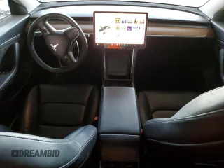 2020 Tesla Model 3 Standard Range Plus with VIN 5YJ3E1EA6LF645215, listed as a Copart auction lot 47882375 with 69,317 mi miles and Salvage Title. Bid and sale history available at DreamBid. Image 8.