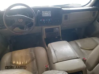 2004 Cadillac Escalade EXT z VIN 3GYEK62N34G324955, wystawiony jako Copart lot #87479764 z przebiegiem 218 127 mil mil oraz Szkody całkowita. Historia ofert i sprzedaży dostępna na DreamBid. Obrazek 8.