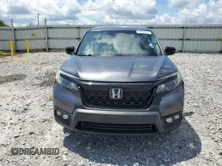 2021 Honda Passport EX-L with VIN 5FNYF8H54MB002017, listed as a Copart auction lot 59850975 with 54,275 mi miles and Salvage title. Bid and sale history available at DreamBid. Image 5.