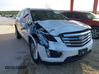 2019 Cadillac XT5 FWD with VIN 1GYKNARS9KZ111756, listed as a IAAI auction lot 41488648 with 92,937 mi miles and . Bid and sale history available at carsss.com. Image 1.