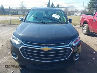 2021 Chevrolet Traverse LT Cloth with VIN 1GNERGKW5MJ197065, listed as a IAAI auction lot 41861029 with 57,992 mi miles. Bid and sale history available at carsss.com. Image 12.
