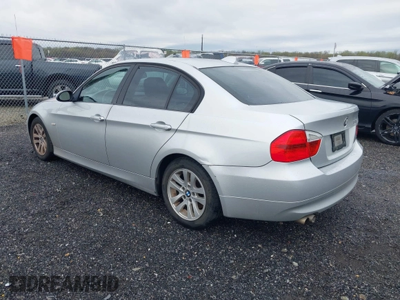 2007 BMW 3 Series 328i with VIN WBAVA33557PG53078, listed as a IAAI auction lot 41936187 with 186,492 mi miles. Bid and sale history available at carsss.com. Image 3.