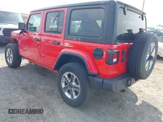 2020 Jeep Wrangler Unlimited Sahara with VIN 1C4HJXEN0LW184564, listed as a IAAI auction lot 42439173 with 79,426 mi miles and . Bid and sale history available at DreamBid. Image 3.