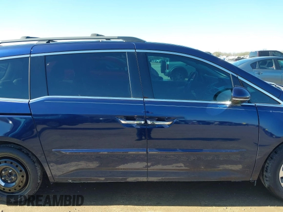 2016 Honda Odyssey Touring Elite with VIN 5FNRL5H98GB083221, listed as a IAAI auction lot 41626604 with 145,341 mi miles and . Bid and sale history available at DreamBid. Image 14.