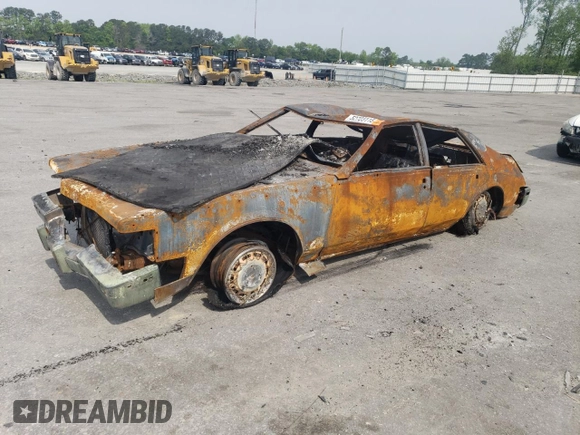 1985 Cadillac Seville z VIN 1G6KS6988FE825863, wystawiony jako Copart lot #52723115 z przebiegiem Nie podano mil oraz Szkoda całkowita • Salvage title. Historia ofert i sprzedaży dostępna na DreamBid. Obrazek 1.