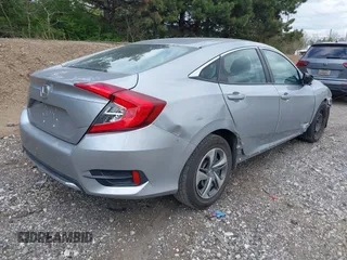 2019 Honda Civic LX with VIN 2HGFC2F61KH509233, listed as a IAAI auction lot 42048400 with 37,368 mi miles and . Bid and sale history available at DreamBid. Image 4.
