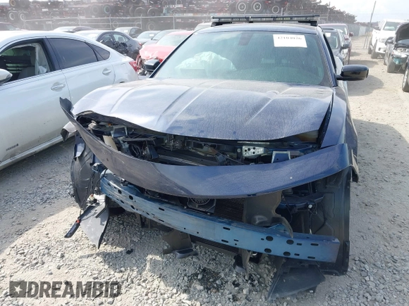 2021 Dodge Charger Police with VIN 2C3CDXAT6MH639895, listed as a IAAI auction lot 42104026 with 24,314 mi miles and . Bid and sale history available at DreamBid. Image 6.
