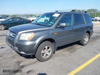 2008 Honda Pilot EX-L with VIN 5FNYF18598B057446, listed as a IAAI auction lot 42063418 with 181,749 mi miles. Bid and sale history available at carsss.com. Image 2.