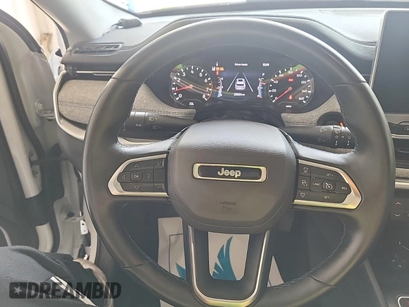 2022 Jeep Compass Latitude with VIN 3C4NJDBB3NT205928, listed as a IAAI auction lot 42832409 with 22,634 mi miles and . Bid and sale history available at DreamBid. Image 8.