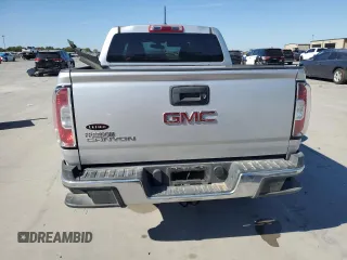 2020 GMC Canyon 2WD with VIN 1GTG5BEA2L1237021, listed as a Copart auction lot 76358214 with 77,815 mi miles and Salvage Title. Bid and sale history available at carsss.com. Image 6.