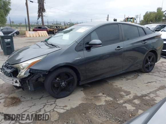 2016 Toyota Prius Four with VIN JTDKARFU8G3015083, listed as a IAAI auction lot 42191765 with 168,820 mi miles and . Bid and sale history available at DreamBid. Image 2.