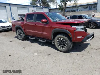 2023 Nissan Frontier PRO-4X with VIN 1N6ED1EK2PN618618, listed as a Copart auction lot 57197604 with 25,362 mi miles and Salvage Title. Bid and sale history available at carsss.com. Image 4.