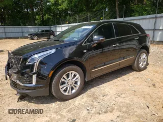 2023 Cadillac XT5 FWD Luxury с VIN 1GYKNAR46PZ106118, выставлен на аукционе Copart как лот 56732195 с пробегом 25 801 миль миль и Списание • Salvage title. История ставок и продаж доступна на DreamBid. Изображение 1.