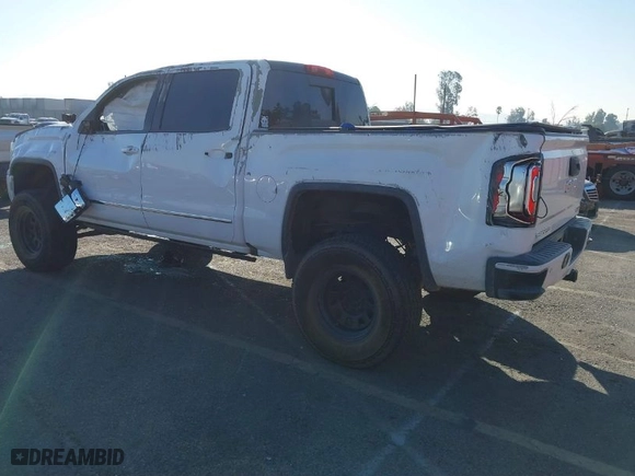 2016 GMC Sierra 1500 SLT with VIN 3GTU2NEC2GG244329, listed as a IAAI auction lot 40810002 with 121,716 mi miles. Bid and sale history available at carsss.com. Image 3.