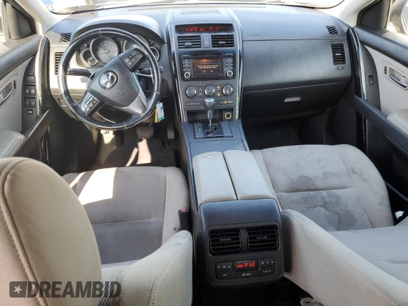 2014 Mazda CX-9 Sport with VIN JM3TB2BV6E0431971, listed as a Copart auction lot 63778635 with 136,287 mi miles and Salvage title. Bid and sale history available at DreamBid. Image 8.