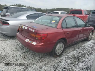 2000 Saturn SL with VIN 1G8ZK5276YZ255844, listed as a Copart auction lot 42003175 with 239,377 mi miles and Salvage title. Bid and sale history available at DreamBid. Image 3.