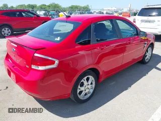 2008 Ford Focus SE with VIN 1FAHP35N98W125632, listed as a IAAI auction lot 42204436 with 232,509 mi miles and . Bid and sale history available at carsss.com. Image 4.
