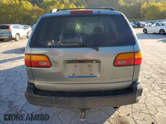 1999 Toyota Sienna LE with VIN 4T3ZF13C4XU137126, listed as a Copart auction lot 75205074 with 0 mi miles and Salvage Title. Bid and sale history available at carsss.com. Image 6.