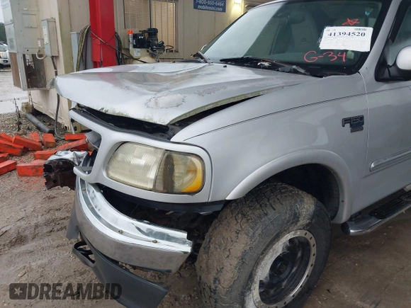 2003 Ford F-150 XL with VIN 1FTRX18W53NA09107, listed as a IAAI auction lot 41394520 with 187,489 mi miles. Bid and sale history available at carsss.com. Image 13.