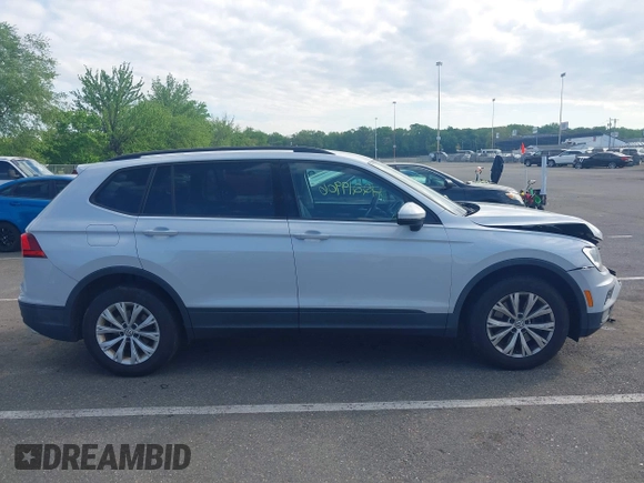 2018 Volkswagen Tiguan S with VIN 3VV0B7AX5JM025815, listed as a IAAI auction lot 42219906 with 168,122 mi miles and . Bid and sale history available at DreamBid. Image 13.