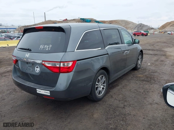 2011 Honda Odyssey EX-L with VIN 5FNRL5H61BB036921, listed as a IAAI auction lot 41939802 with 126,656 mi miles. Bid and sale history available at carsss.com. Image 4.