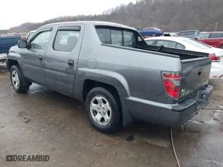 2012 Honda Ridgeline RT with VIN 5FPYK1F24CB456298, listed as a IAAI auction lot 40869948 with 123,329 mi miles. Bid and sale history available at carsss.com. Image 3.