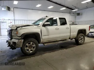 2016 GMC Sierra 2500HD SLE z VIN 1GT22SEG5GZ251378, wystawiony jako Copart lot #52381015 z przebiegiem 144 304 mil mil oraz Szkoda całkowita • Salvage title. Historia ofert i sprzedaży dostępna na DreamBid. Obrazek 1.