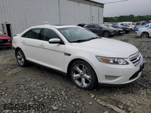 2012 Ford Taurus SHO with VIN 1FAHP2KT2CG141879, listed as a Copart auction lot 56558365 with 105,230 mi miles and Salvage title. Bid and sale history available at DreamBid. Image 4.