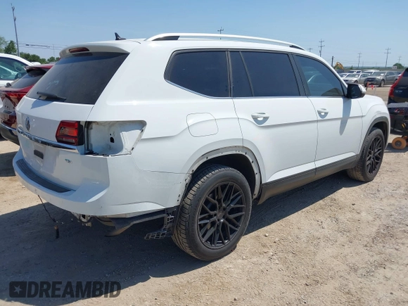 2018 Volkswagen Atlas SE with VIN 1V2CP2CA6JC595282, listed as a IAAI auction lot 42227930 with 95,799 mi miles and . Bid and sale history available at DreamBid. Image 4.